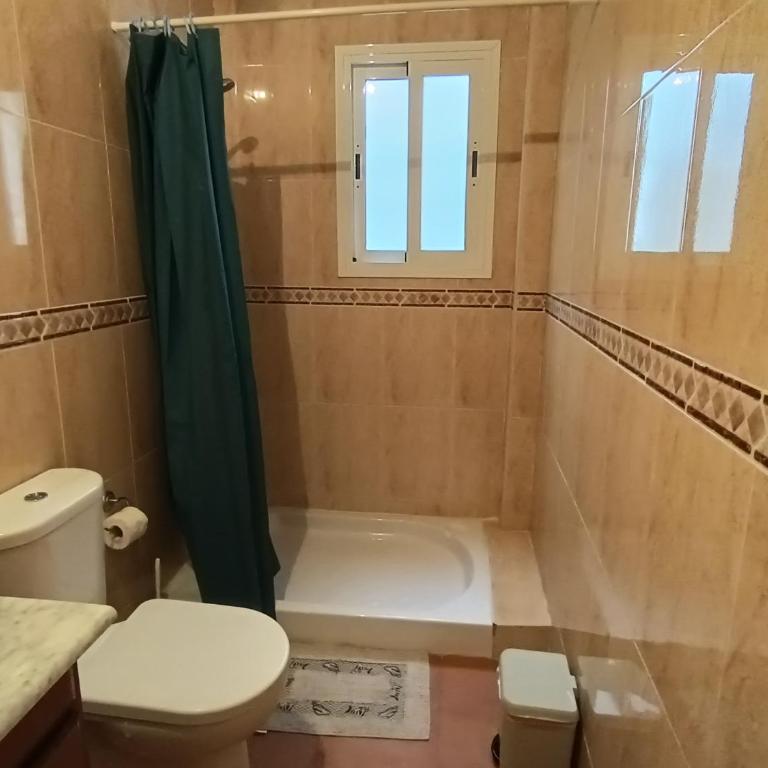 Casa baja naturista con patio en primera línea de playa con piscina comunitaria! - Apartamento de 1 dormitorio - 49