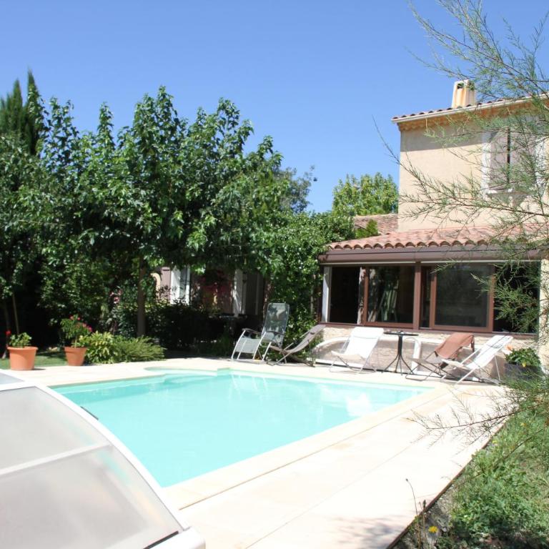 Chambres d'Hôtes dans villa avec piscine chez Raphaële - Chambre Double - Vue sur Jardin - 4
