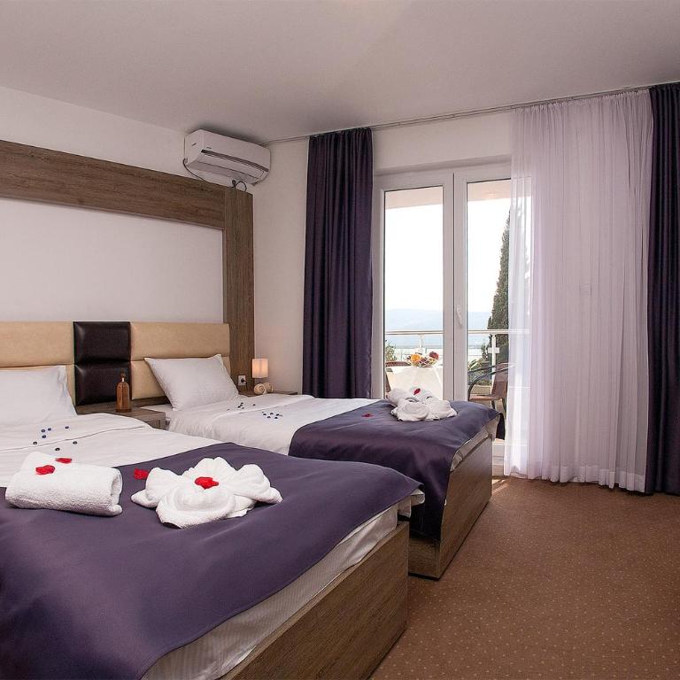 Guest House Aria - Dvokrevetna soba sa Bračnim Krevetom ili Zasebnim Krevetima, Balkonom i Pogledom na More - 3