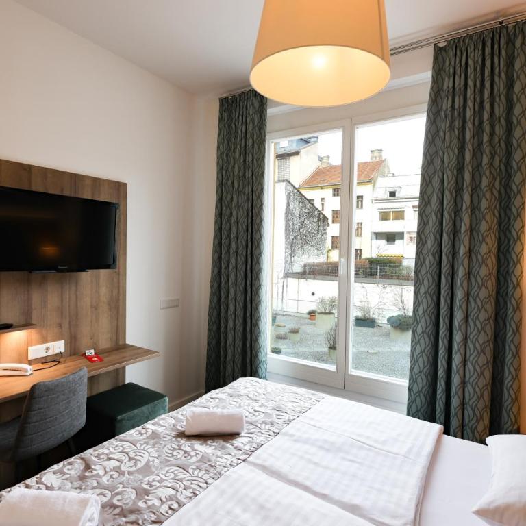 Altstadt Hotel Hofwirt Salzburg - Doppelzimmer Plus mit Gartenblick - 2