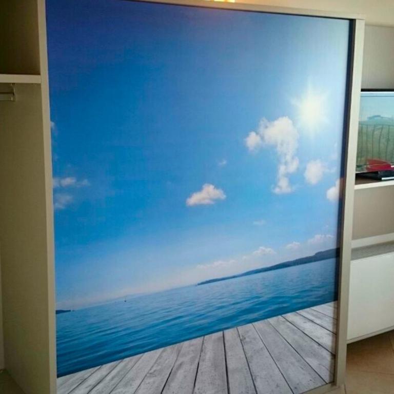 Relais Rosa Dei Venti -Ciao Vacanze- - Appartamento Standard con 2 Camere da Letto e Vista Lago Parziale - 1