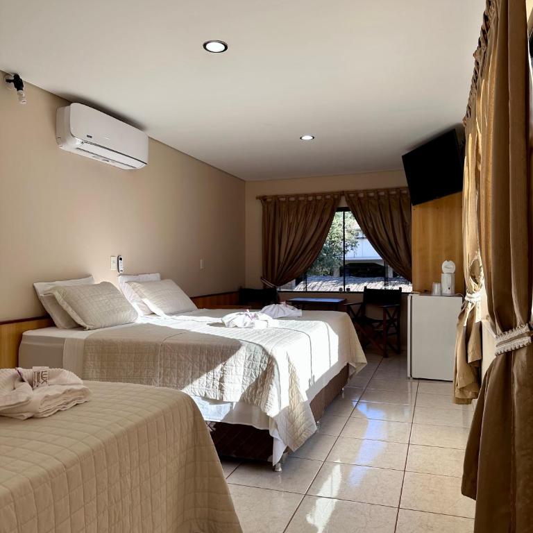Parque Hotel Manantial - Comfort Quadruple Room - 7