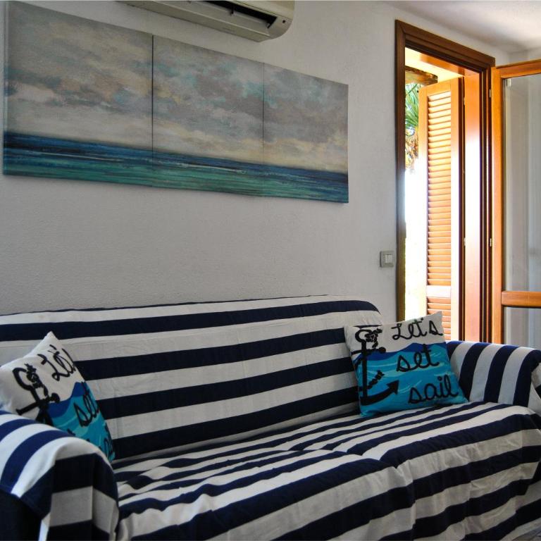 Villa Pietra Rossa - Appartamento con 2 Camere da Letto e Patio - 2