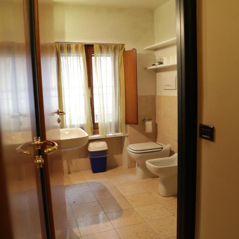 Central Bed - Two-Bedroom Apartment - 16