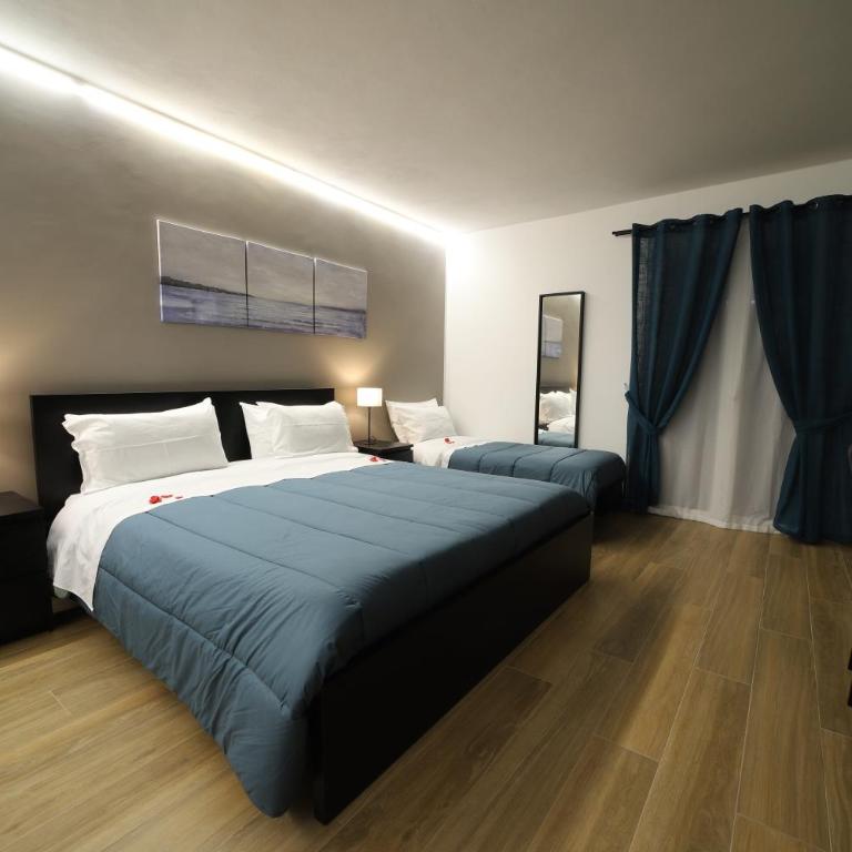 Boscò Suites - Camera Deluxe - 1