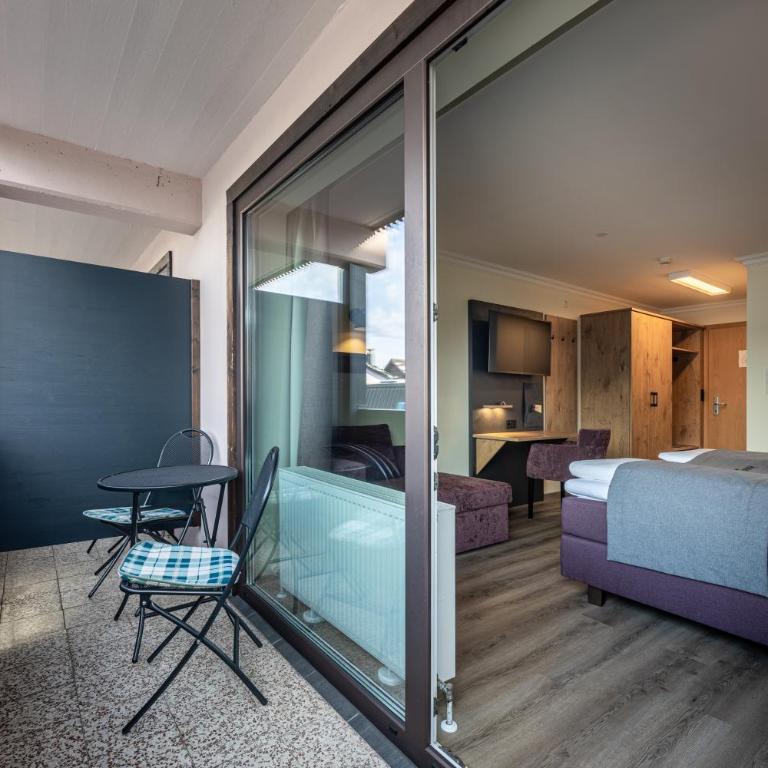 Hotel Fischer - Doppelzimmer mit Balkon - 8