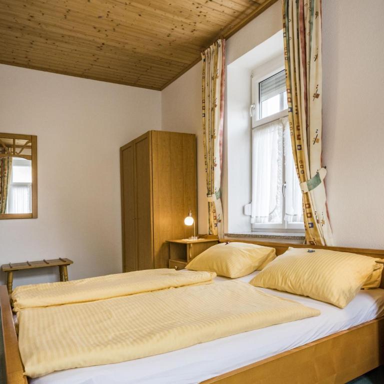 Haus Alpenruhe - Apartment mit Gartenblick - 11