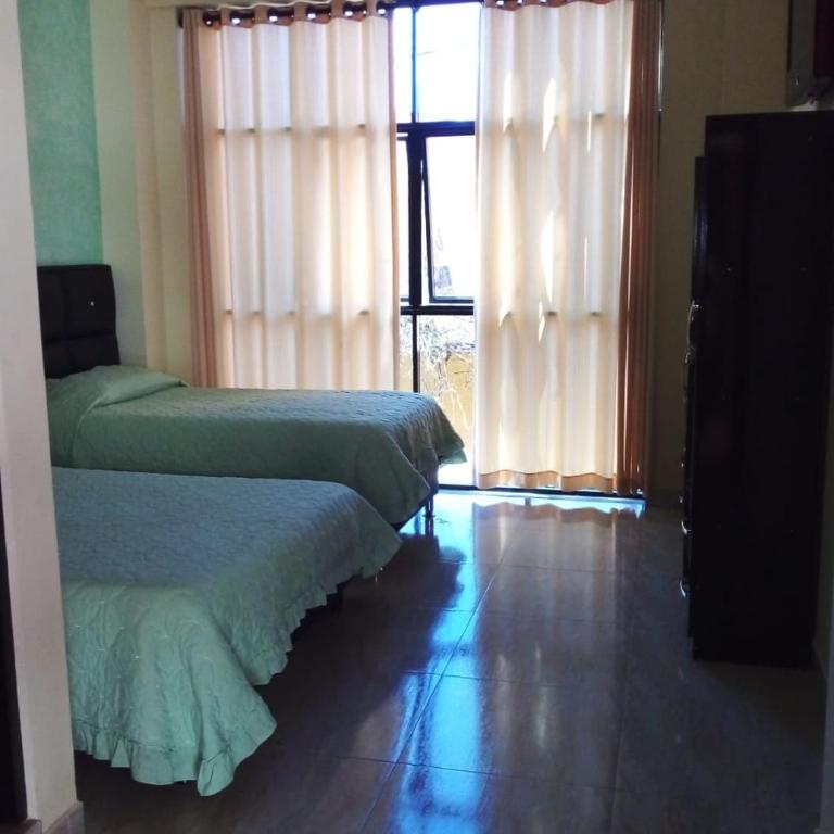 Hostal El Paraiso - Habitación Doble con baño privado - 2 camas - 3