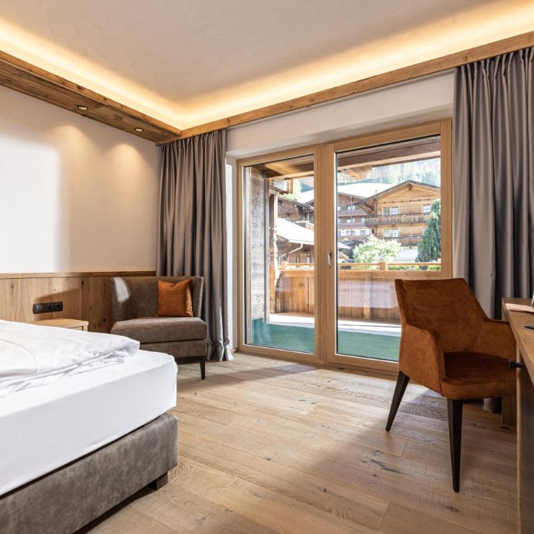 Alpbacherhof - Mountain & Spa Resort - Deluxe Einzelzimmer mit Balkon - 3
