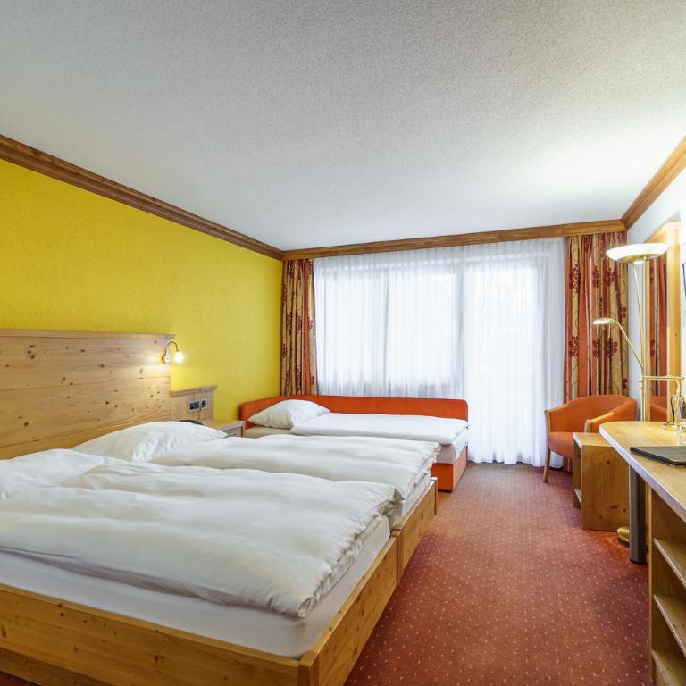 Hotel Alpenroyal - Dreibettzimmer mit Balkon oder Terrasse im Erdgeschoss - 2