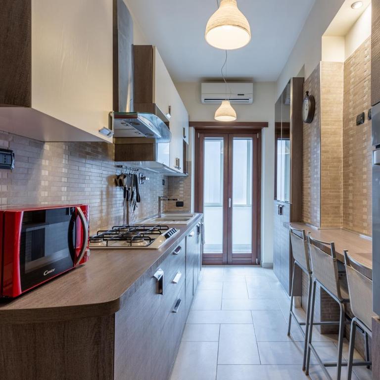 Naima Apartment San Pietro - Three-Bedroom Apartment - 35