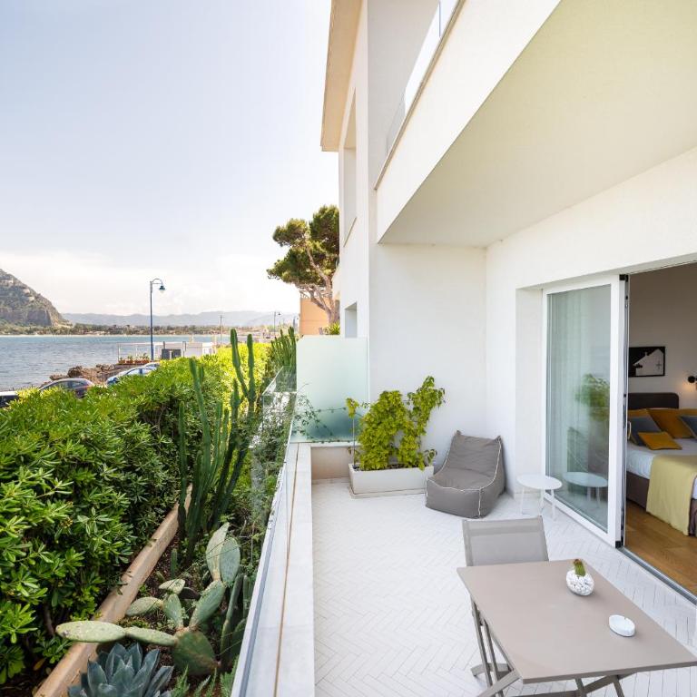 Unìco Boutique Hotel d'Arte - Habitación Doble con balcón y vistas al mar - 4