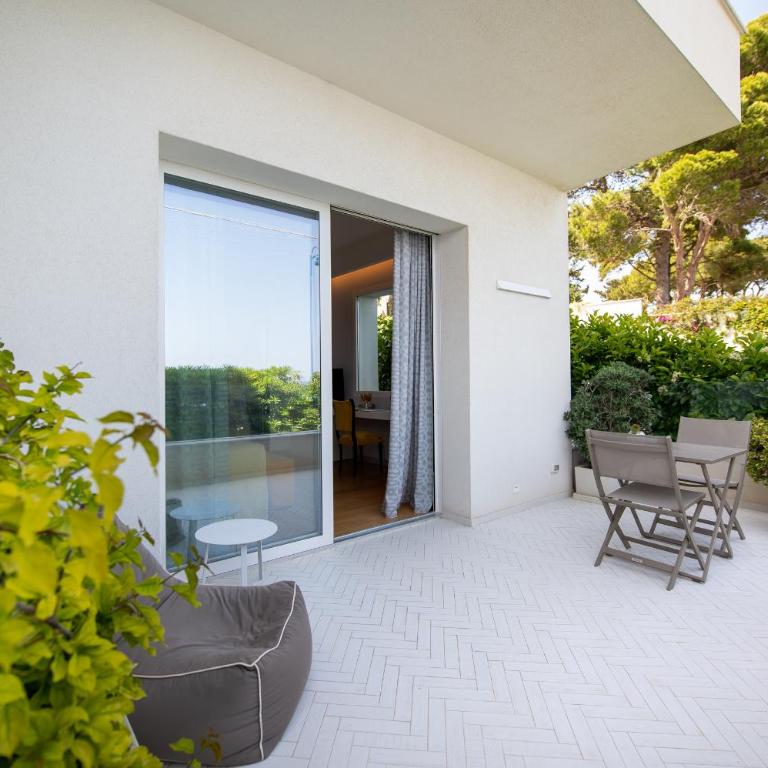 Unìco Boutique Hotel d'Arte - Habitación Doble con balcón y vistas al mar - 5