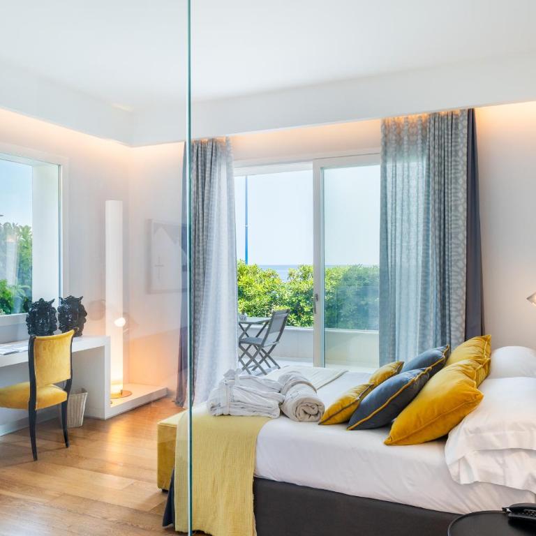Unìco Boutique Hotel d'Arte - Habitación Doble con balcón y vistas al mar - 10
