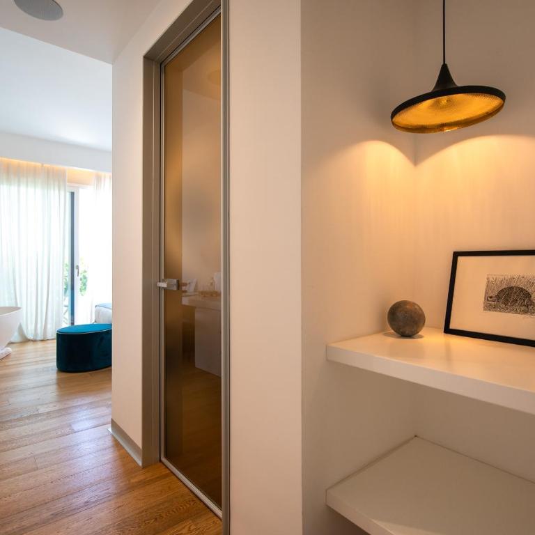 Unìco Boutique Hotel d'Arte - Habitación Doble Deluxe con balcón - 7