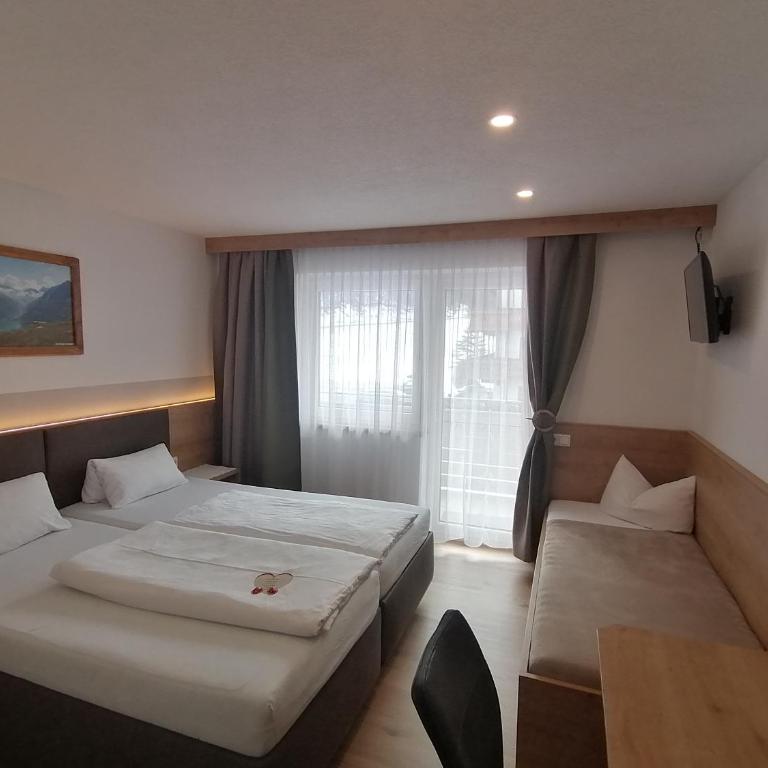 Gästehaus Holaus - Doppelzimmer mit Balkon - 3