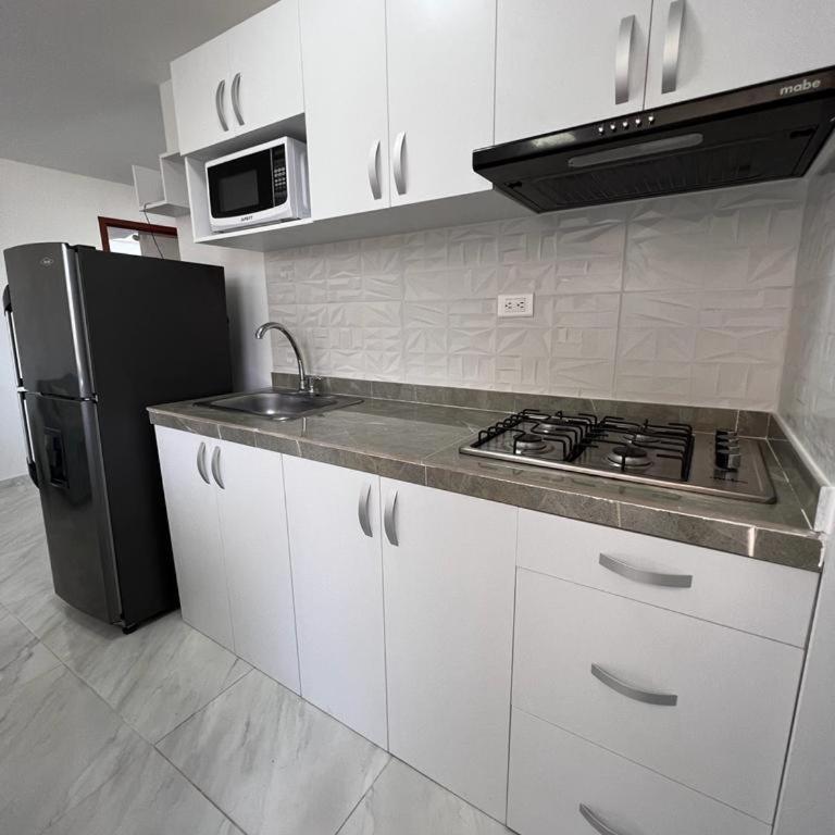 Liliana Prado Edificio Bailey Boat Apt 303 - Two-Bedroom Apartment - 6