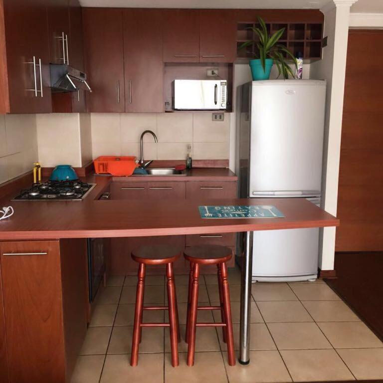 Edificio cerca de playa cavancha y Brava - Apartamento de 1 dormitorio - 12