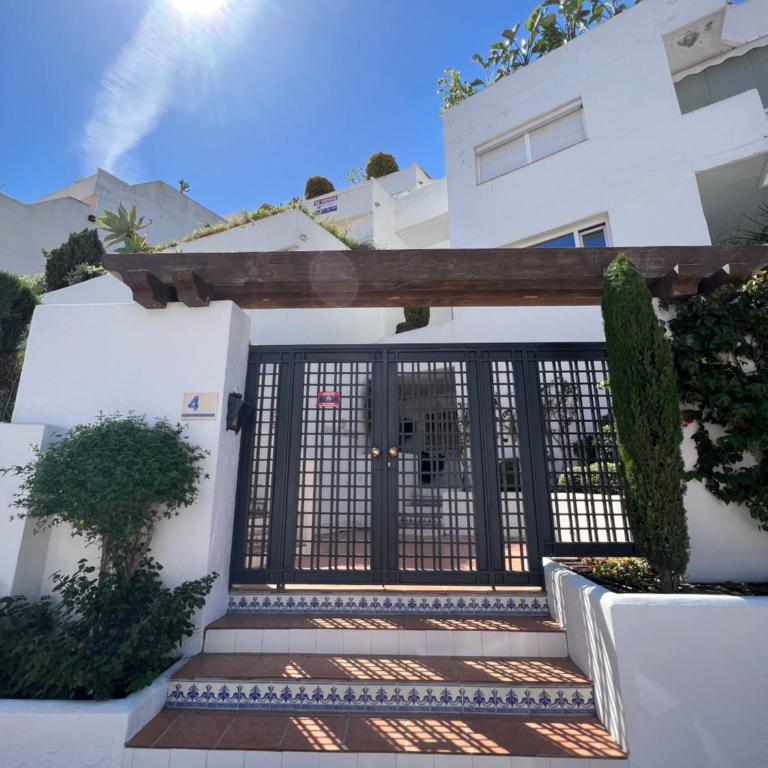 Impeccable large apartment with immense terrace and private garden overlooking the mountain, featuring 2 bedrooms and sleeping up to 4 guests located 100 meters from Plaza Maestranza - Two-Bedroom Apartment - 90