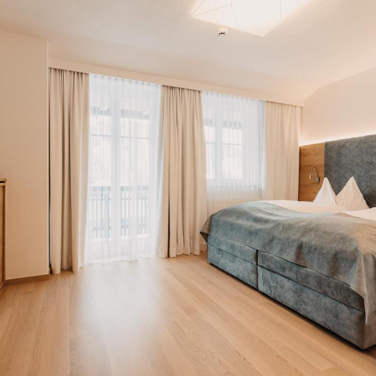 Alpina Wagrain - Doppelzimmer mit Zustellbett mit Balkon - 2