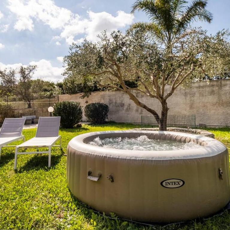 {Villa Jacuzzi Privata}sul mare di Fontane Bianche - Villa con vistas al jardín - 25
