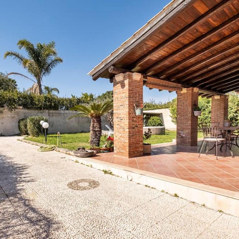 {Villa Jacuzzi Privata}sul mare di Fontane Bianche - Villa con vistas al jardín - 26