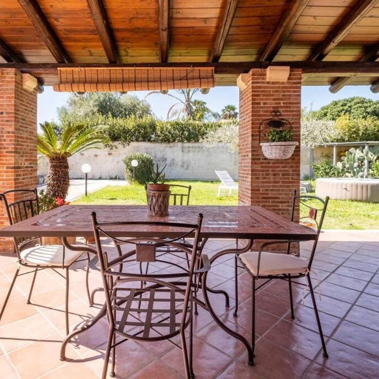 {Villa Jacuzzi Privata}sul mare di Fontane Bianche - Villa con vistas al jardín - 23
