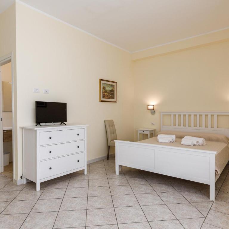 Casa Tacconi - Camera Quadrupla Comfort - 13