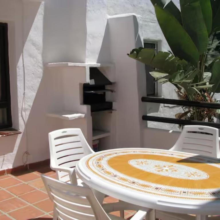 Andalusian style apartment in Pueblo Evita exclusive holiday complex - Apartamento - 12