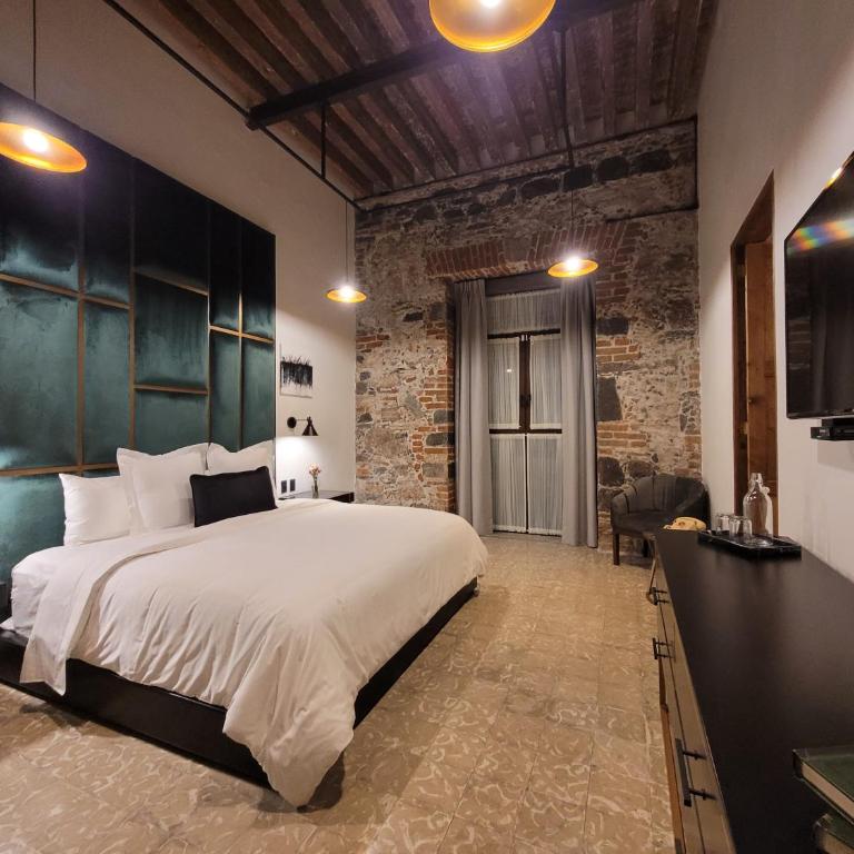 Milo Collection Hotel - Suite con cama grande - 3