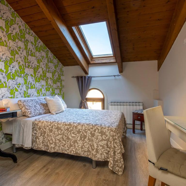 Apartamentos Vino Tinto y Restaurante Tomate Rosa - Habitación Doble Deluxe con bañera - 2