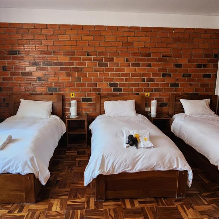 Qhini Hotel Boutique - Habitación Triple Estándar - 5