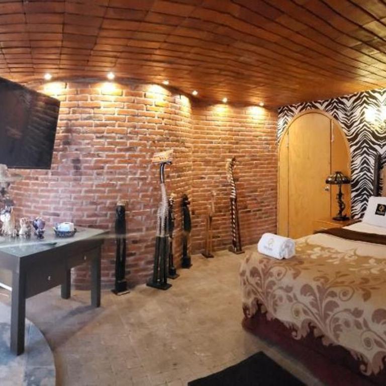 Hotel Temático Casa Puebla - Habitación con cama extragrande y vistas a la montaña - 13