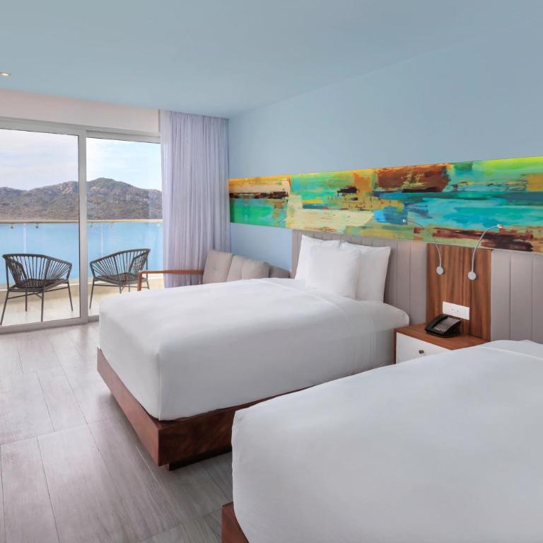 Courtyard by Marriott Mazatlan Beach Resort - Deluxe Queen Room with Two Queen Beds, Balcony and Ocean View - 1