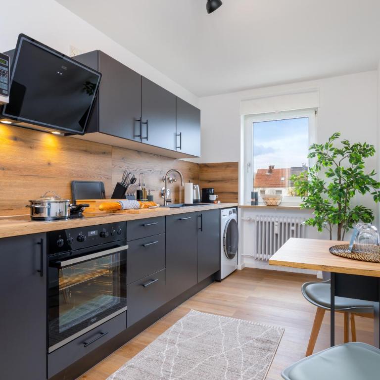 UNiQE - design apartment - SKY-TV - kitchen - Apartment mit 2 Schlafzimmern - 15