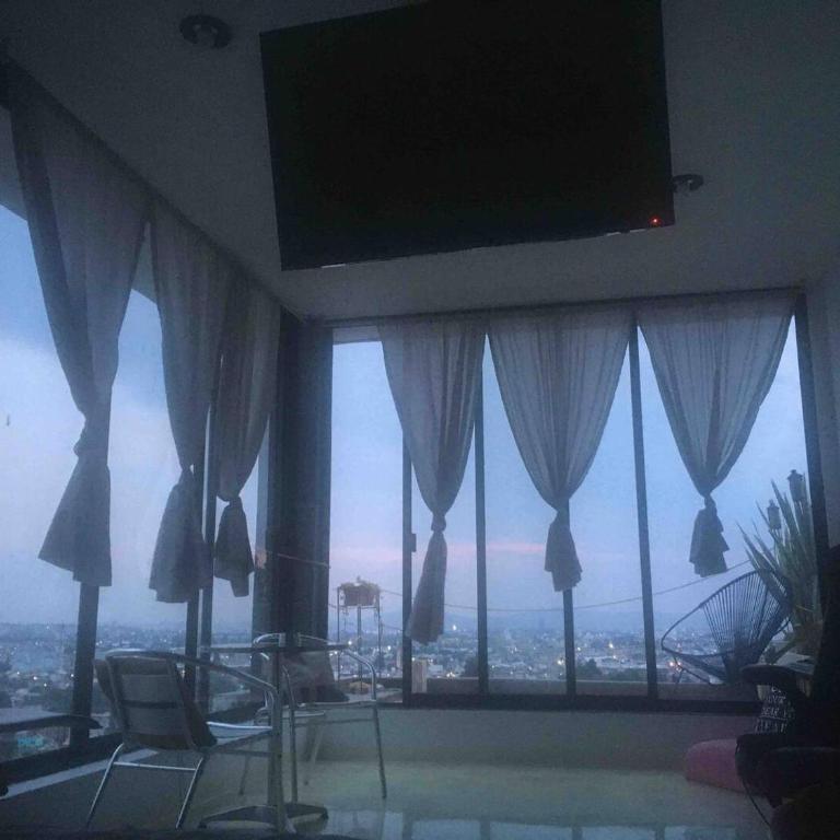 Loft en Tercer Piso con Vista Panoramica - Queen Room with Balcony - 9