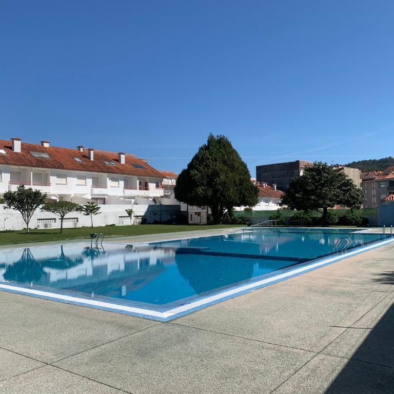 URBANIZACION CON PISCINA ARNELAS SANXENXO - Apartamento con terraza - 4
