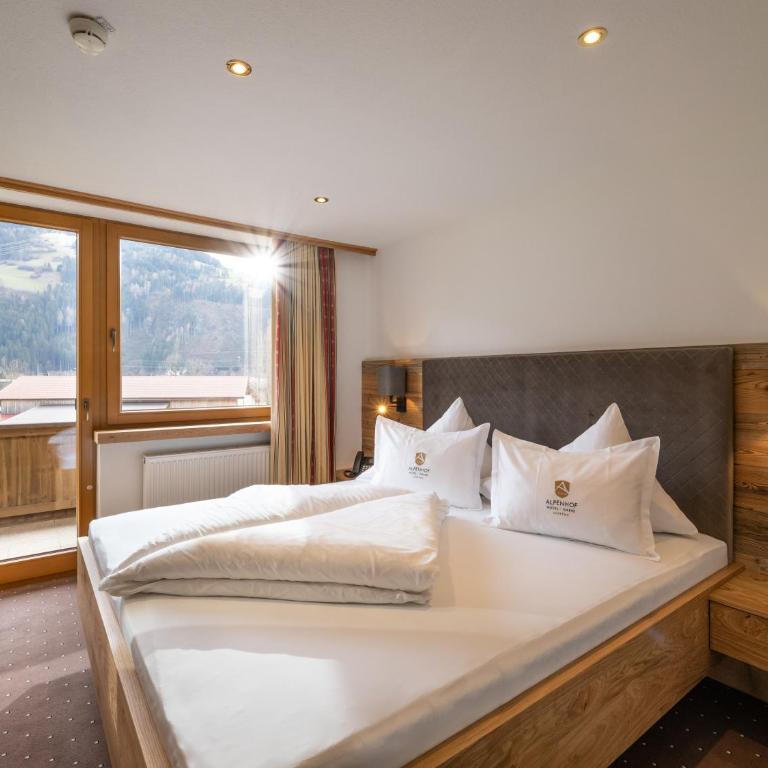 Alpenhof Hotel Garni Suprême - Deluxe Doppelzimmer mit Balkon - 6