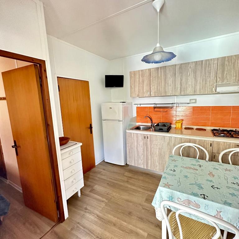 Camping Village La Sorgente - Bungalow con Patio - 6