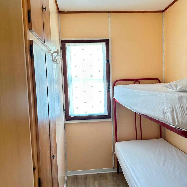 Camping Village La Sorgente - Bungalow con Patio - 4