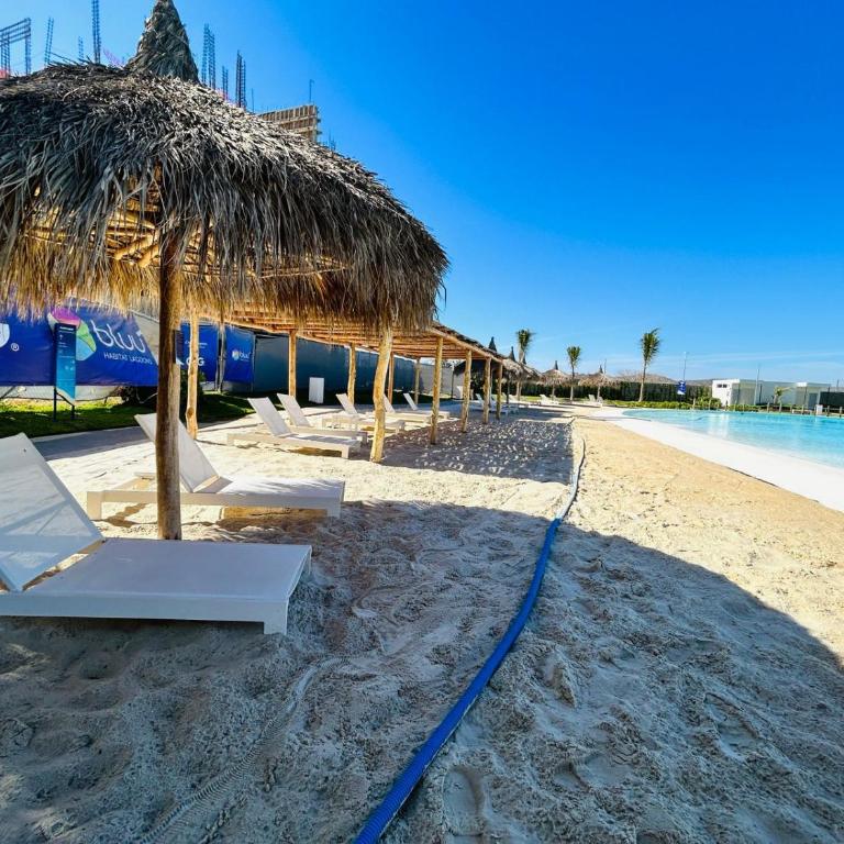 alberca tipo playa,10 min de la playa by G P S rentas - Two-Bedroom Apartment - 23