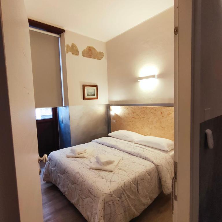 Apartment Nido Stazione - Camera Tripla con Bagno Privato Esterno - 15