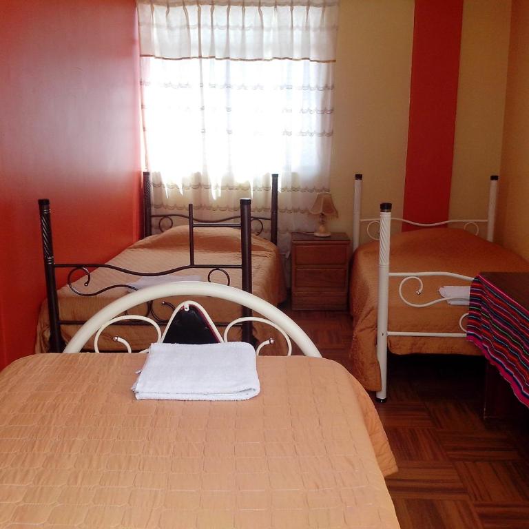 Totorani Inn - Cama en habitación compartida con 4 camas - 4