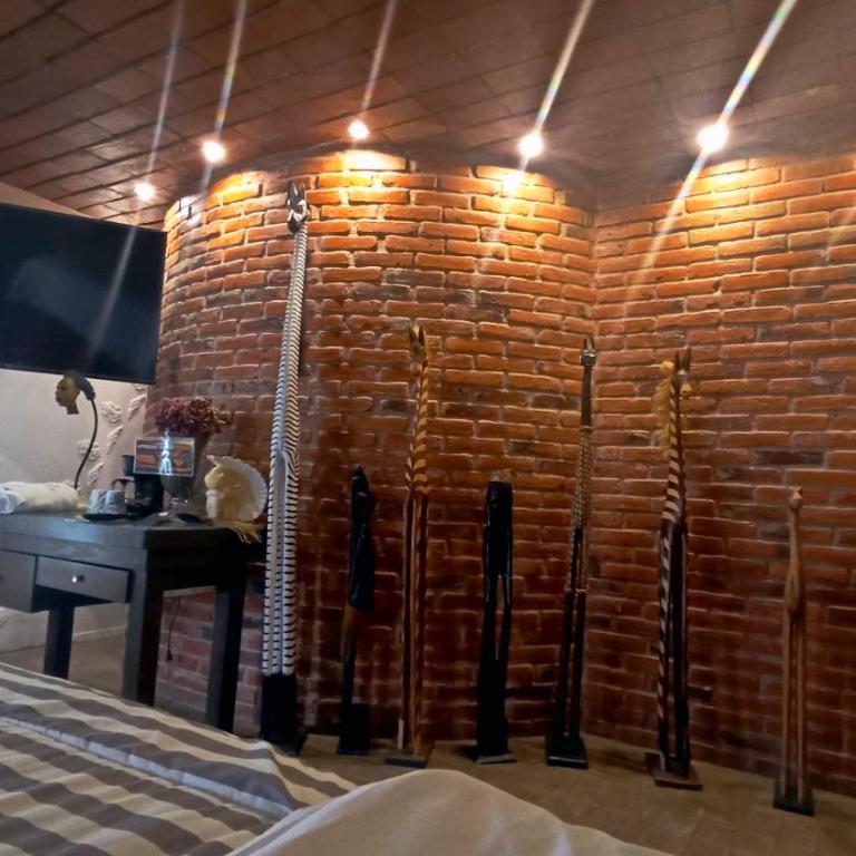 Hotel Temático Casa Puebla - Habitación con cama extragrande y vistas a la montaña - 2