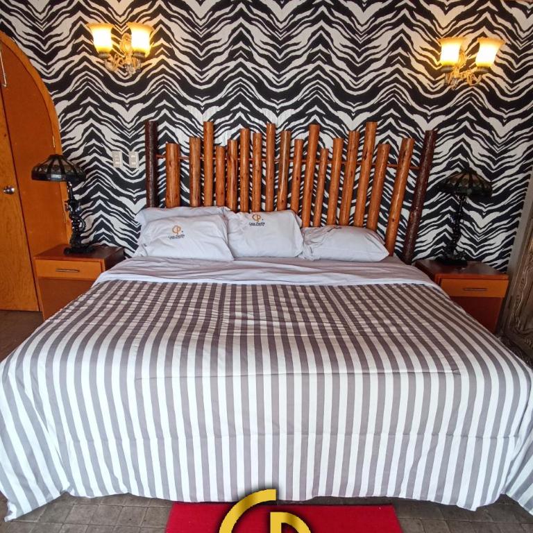 Hotel Temático Casa Puebla - Habitación con cama extragrande y vistas a la montaña - 6