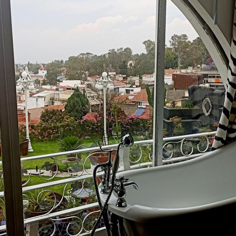 Hotel Temático Casa Puebla - Habitación con cama extragrande y vistas a la montaña - 9