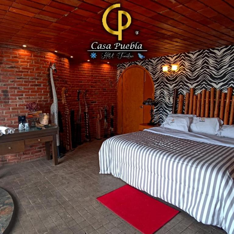 Hotel Temático Casa Puebla - Habitación con cama extragrande y vistas a la montaña - 11