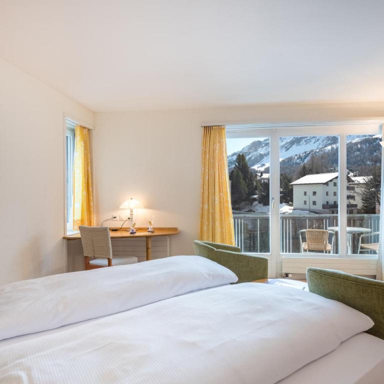 Schweizerhaus Swiss Quality Hotel - Deluxe Doppelzimmer mit Bergblick - 1