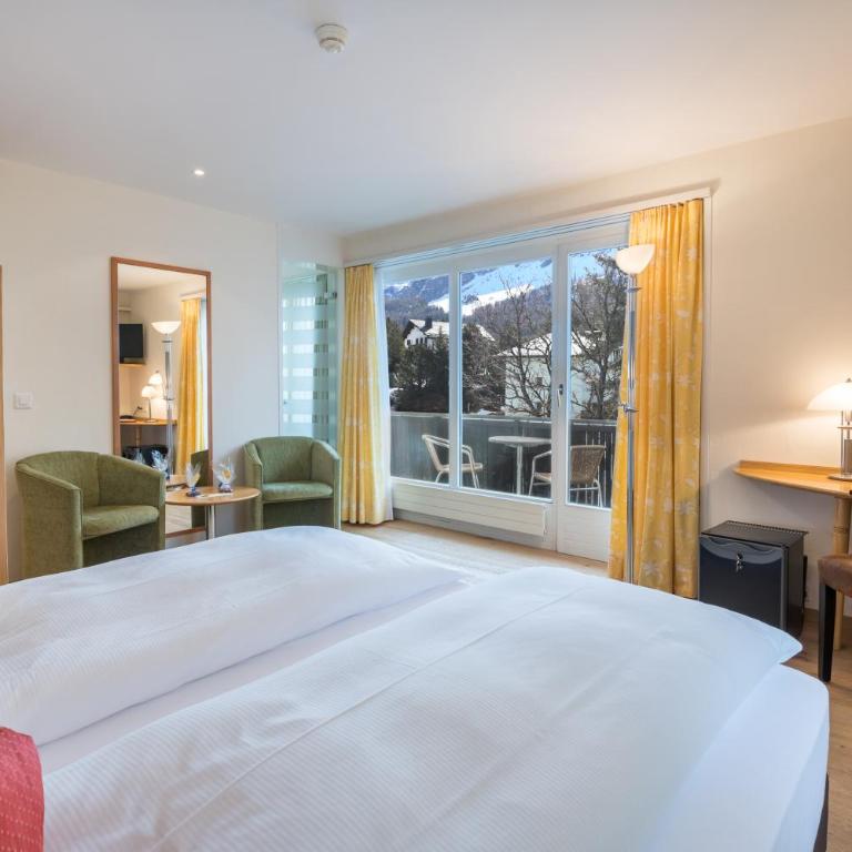 Schweizerhaus Swiss Quality Hotel - Deluxe Doppelzimmer mit Bergblick - 3