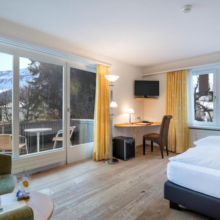 Schweizerhaus Swiss Quality Hotel - Deluxe Doppelzimmer mit Bergblick - 4